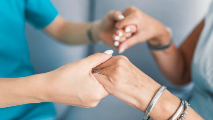 Old and young holding hands, Breaches in Duty of Care, Care in Aged Care, Complaints in Aged Care, Complaints in Duty of Care, Dignity in Aged Care, Dignity of Risk in Aged Care, Duty of Care, Duty of Care in Aged Care, Respect in Aged Care, Responsibilites in Aged Care, Rights in Aged Care