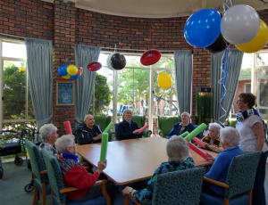 Balloon Games for AFL Grand Final Day Celebrations, afl grand final day celebrations, aged care activities melbourne, aged care celebrations, aged care lifestyle program, aged care melbourne, Aged Care Services
